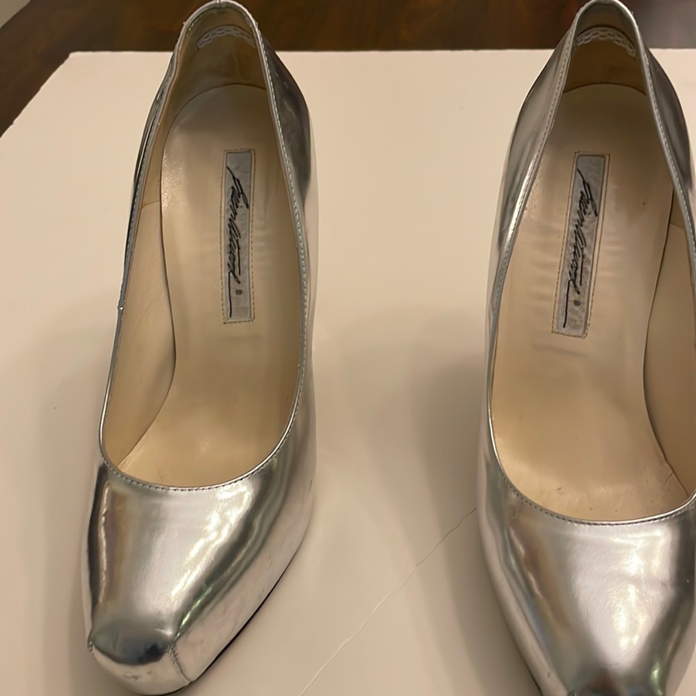 Silver Brian at work very high heels